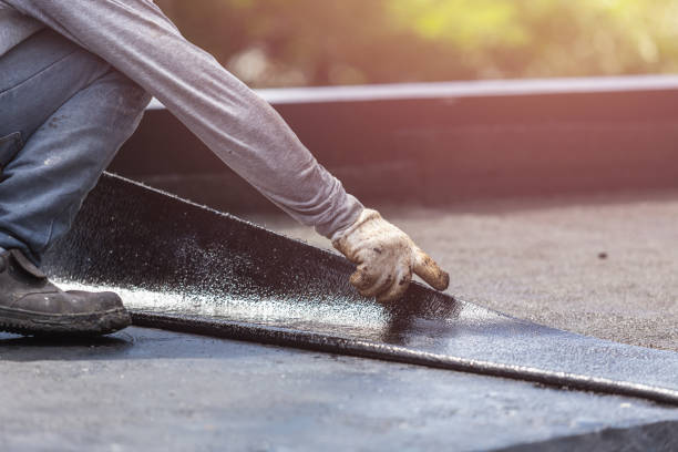 Professional Basement Waterproofing technician working in Tipp City, OH